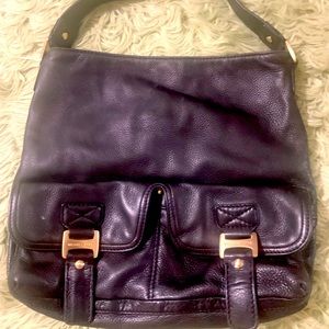 Black Michael Kors ladies pocketbook.